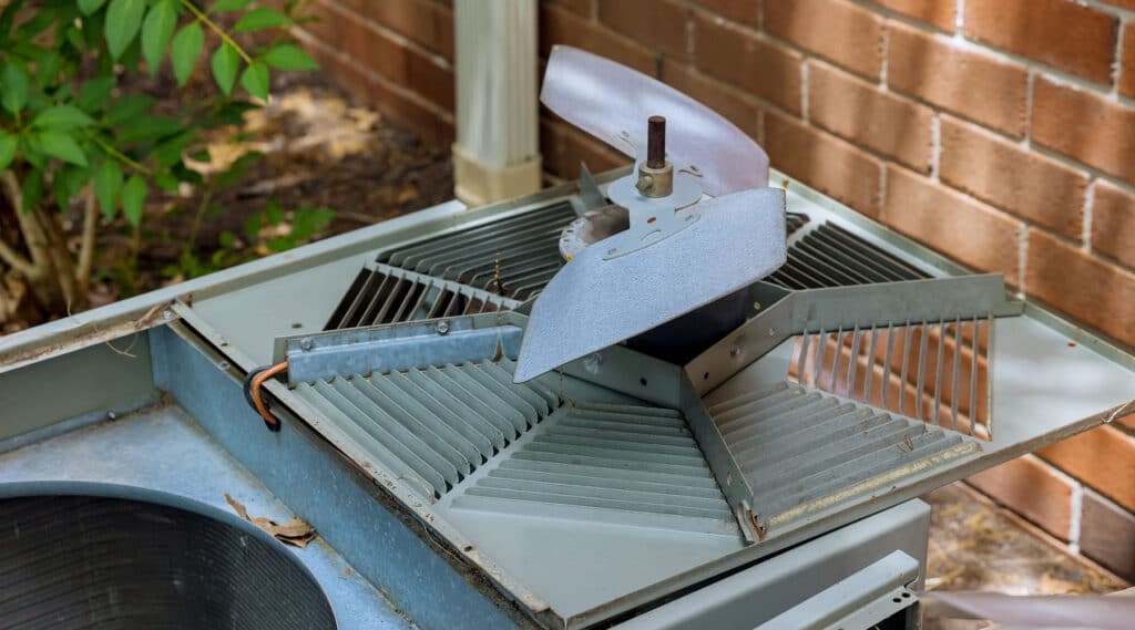 Detailed view of an air conditioner with a visible fan