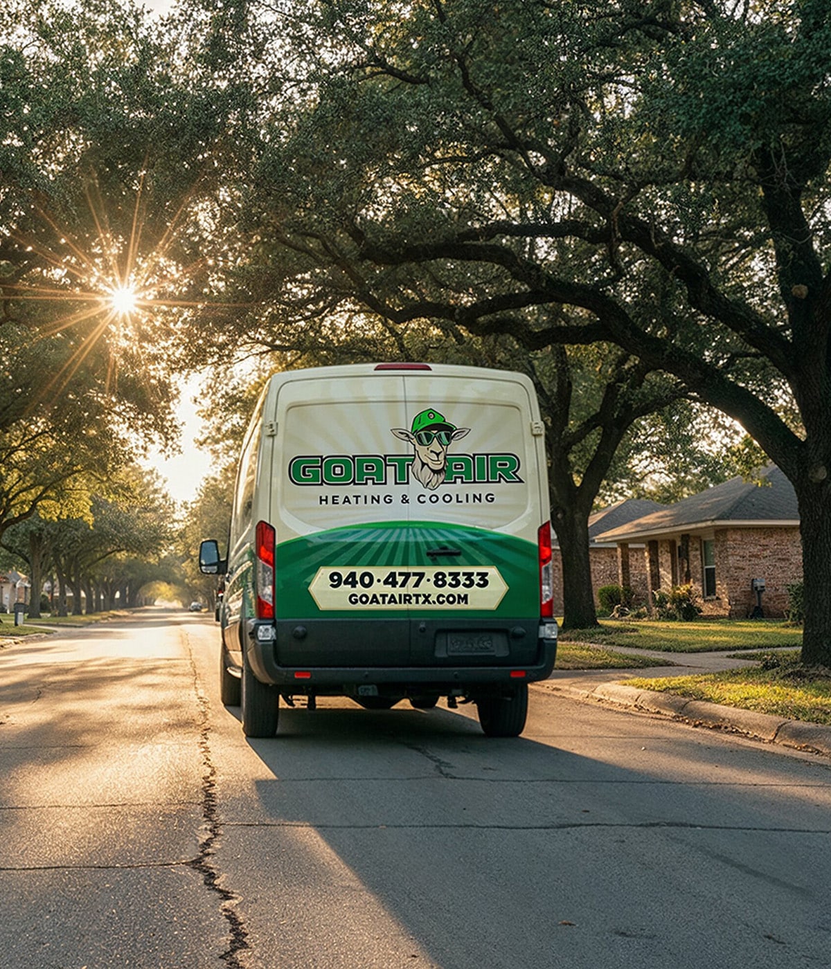 Goat Air heating and cooling truck driving down a residential street