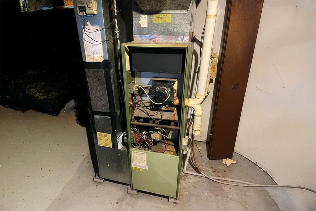 old furnace in basement